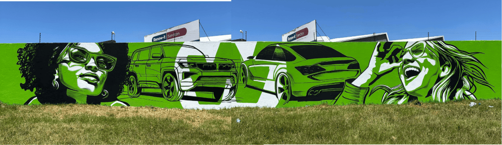 Large-scale branded automotive mural created by Nomad Gallery